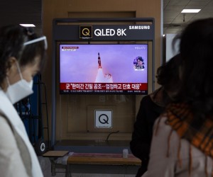 epa10280870 People watch the news at a station in Seoul, South Korea, 02 November 2022. According to South Korea's Joint Chiefs of Staff (JCS), North Korea launched at least three short-range ballistic missiles (SRBMs) into the East Sea, one of which flew across its de facto maritime border with South Korea.  EPA/JEON HEON-KYUN