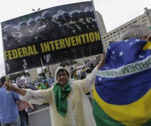 epa10281756 A supporter of Brazil's outgoing President Jair Bolsonaro protests against the election results, outside the Eastern Military Command in Rio de Janeiro, Brazil, 02 November 2022. Thousands of people have gathered in front of the gates of barracks in Sao Paulo, Brasilia and Rio de Janeiro to demand a 'military intervention' against the electoral victory of progressive leader Luiz Inacio Lula da Silva. The rallies were organized through social networks by far-right groups that support Bolsonaro and do not recognize Lula's democratic election.  EPA/ANTONIO LACERDA