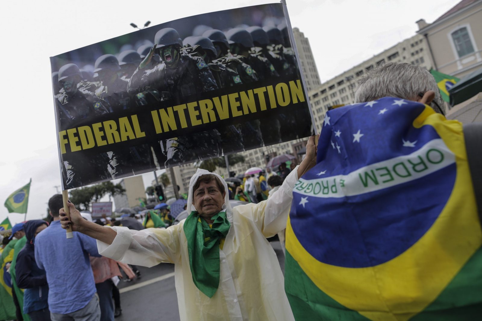 epa10281756 A supporter of Brazil's outgoing President Jair Bolsonaro protests against the election results, outside the Eastern Military Command in Rio de Janeiro, Brazil, 02 November 2022. Thousands of people have gathered in front of the gates of barracks in Sao Paulo, Brasilia and Rio de Janeiro to demand a 'military intervention' against the electoral victory of progressive leader Luiz Inacio Lula da Silva. The rallies were organized through social networks by far-right groups that support Bolsonaro and do not recognize Lula's democratic election.  EPA/ANTONIO LACERDA