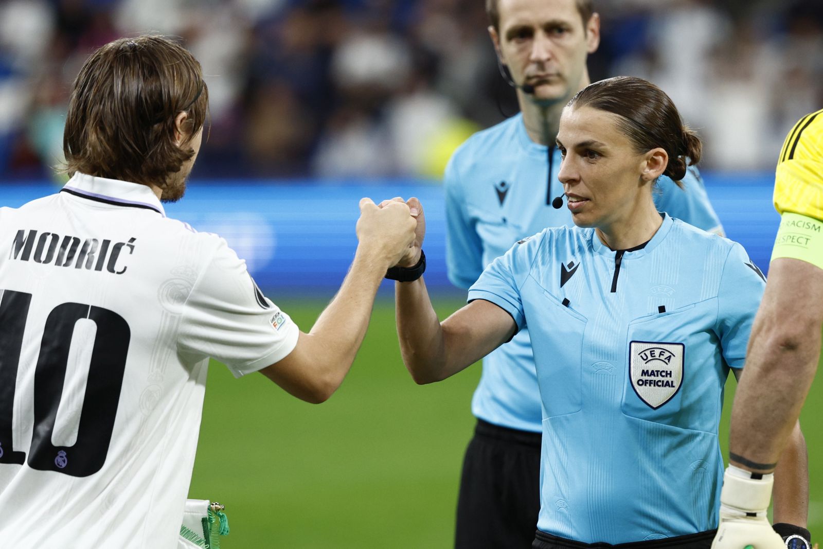 epa10281880 French referee Stephanie Frappart (R) and Real Madrid's Luka Modric (L) react ahead of the UEFA Champions League group F soccer match between Real Madrid and Celtic Glasgow held at Santiago Bernabeu stadium in Madrid, Spain, 02 November 2022.  EPA/RODRIGO JIMENEZ