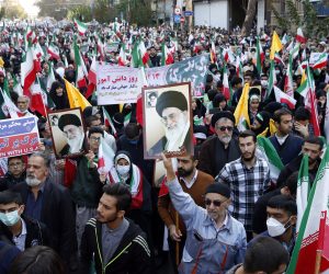 epa10285511 Iranians take part in an anti-US rally marking the 43rd anniversary of the US Embassy takeover, in front of the former US Embassy in Tehran, Iran, 04 November 2022. Iranian students occupied the embassy on 04 November 1979 after the USA granted permission to the late Iranian Shah to be hospitalized in the United States. Over 50 US diplomats and guards were held hostage by students for 444 days. Iranian President Ebrahim Raisi said that Iran gained its freedom 43 years ago and that the country doesn’t need the US to bring freedom for them.  EPA/ABEDIN TAHERKENAREH
