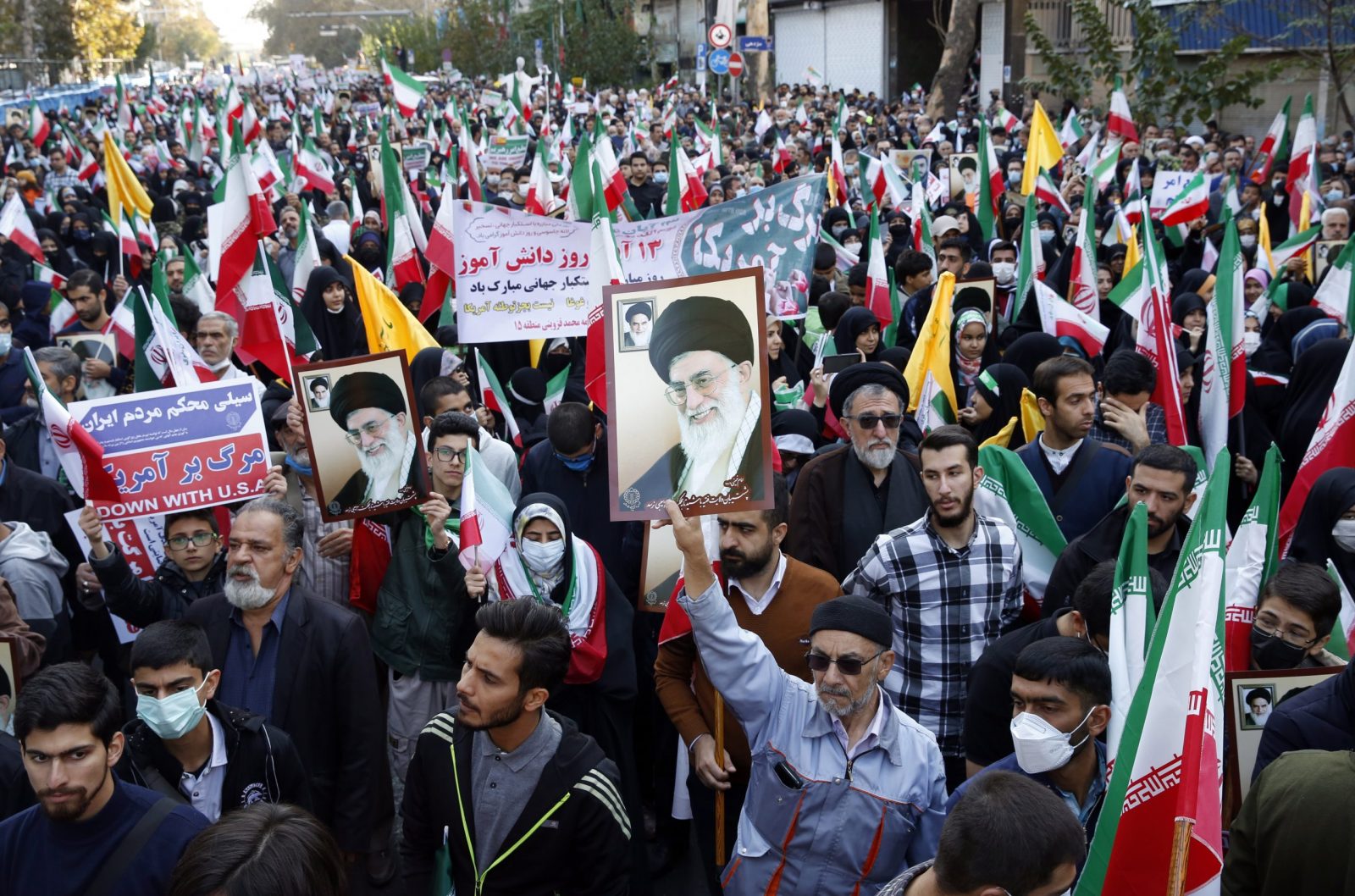 epa10285511 Iranians take part in an anti-US rally marking the 43rd anniversary of the US Embassy takeover, in front of the former US Embassy in Tehran, Iran, 04 November 2022. Iranian students occupied the embassy on 04 November 1979 after the USA granted permission to the late Iranian Shah to be hospitalized in the United States. Over 50 US diplomats and guards were held hostage by students for 444 days. Iranian President Ebrahim Raisi said that Iran gained its freedom 43 years ago and that the country doesn’t need the US to bring freedom for them.  EPA/ABEDIN TAHERKENAREH