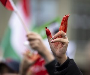 epa10288114 A woman's hand with red paint pictured during a freedom rally for Iranian Women, on the Federal Square (Bundesplatz) in Bern, Switzerland, 05 November 2022. After the death of Mahsa Amini the Iranian people, especially women and youth, are taking to the streets to protest against the cruel treatment of the population. Demonstrators in hundreds of cities are facing repression from the government authorities. For several weeks, the protesters have been demanding that the government respect the most basic human rights.  EPA/ANTHONY ANEX