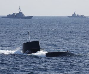epa10289599 The Uzushio-class submarine of the Japan Maritime Self-Defense Force (JMSDF) bursts to the surface during International Fleet Review to commemorate the 70th anniversary of the foundation of the JMSDF at Sagami Bay, off Yokosuka, south of Tokyo, Japan, 06 November 2022.  EPA/ISSEI KATO / POOL