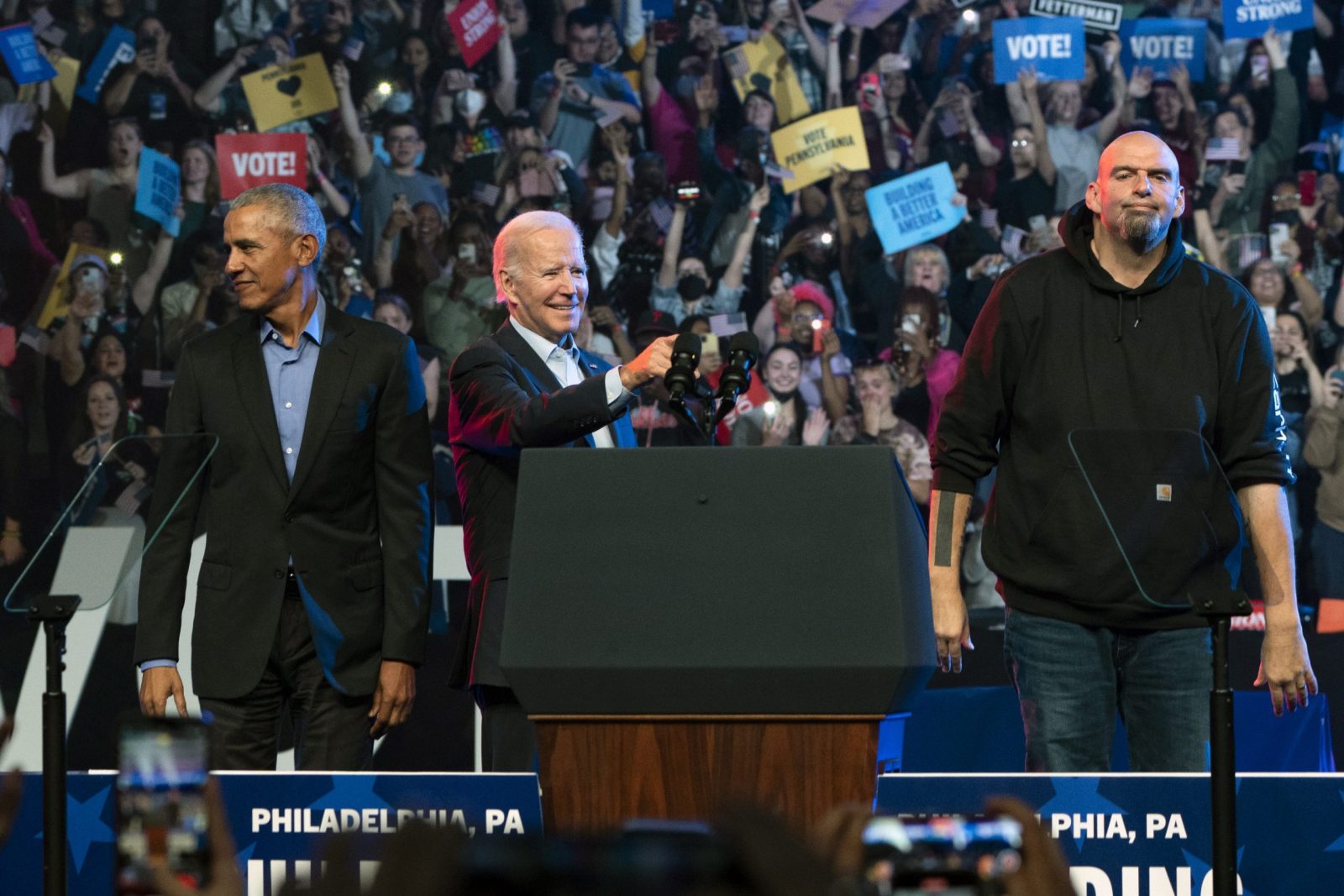 epa10289031 Former US President Barack Obama (L) US President Joe Biden (C) and Senate candidate John Fetterman (R) at a rally in Philadelphia, Pennsylvania, USA, 05 November 2022. The US midterm elections are held every four years at the midpoint of each presidential term and this year include elections for all 435 seats in the House of Representatives, 35 of the 100 seats in the Senate and 36 of the 50 state governors as well as numerous other local seats and ballot issues.  EPA/WILL OLIVER