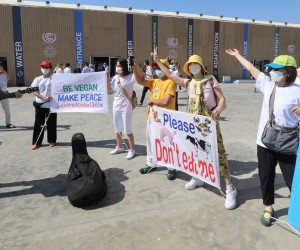 epa10289797 Activists hold banners as they demonstrate at the entrance of the Sharm El Sheikh International Convention Centre, during the COP27 climate summit opening, in Sharm el-Sheikh, Egypt, 06 November 2022. The 2022 United Nations Climate Change Conference (COP27), running from 06 till 18 November in Sharm El-Sheikh, is expected to host one of the largest number of participants in the annual global climate conference of over 40,000 estimated attendees including heads of states and governments, civil society, media and other relevant stakeholders. The events will include Climate Implementation Summit, thematic days, flagship initiatives, and Green Zone activities engaging with climate and other global challenges.  EPA/KHALED ELFIQI