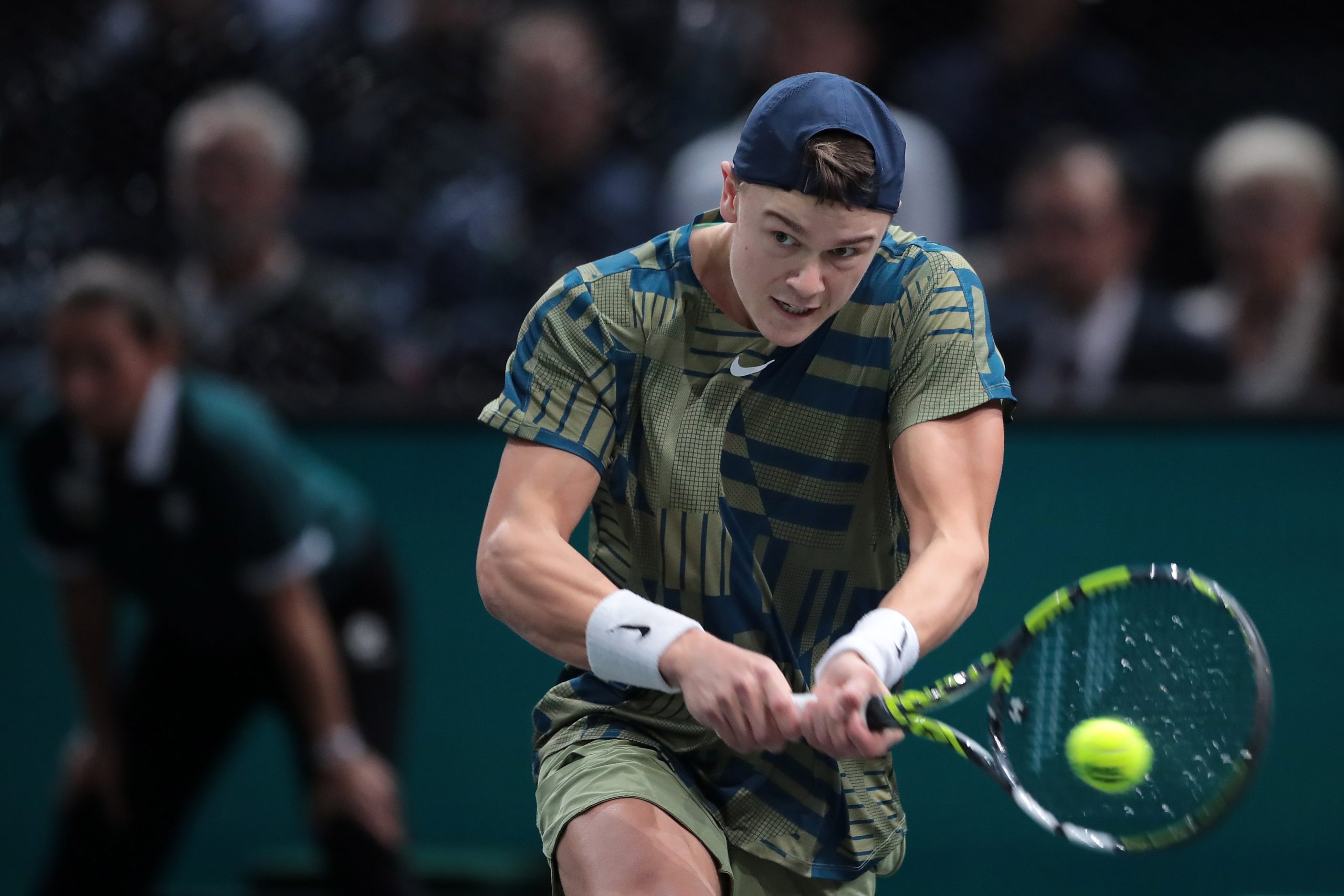 epa10290293 Holger Rune of Denmark ain action during the final match against  Novak Djokovic of Serbia at the Rolex Paris Masters 2022 Tennis Tournament in Paris, France, 06 November 2022.  EPA/CHRISTOPHE PETIT TESSON