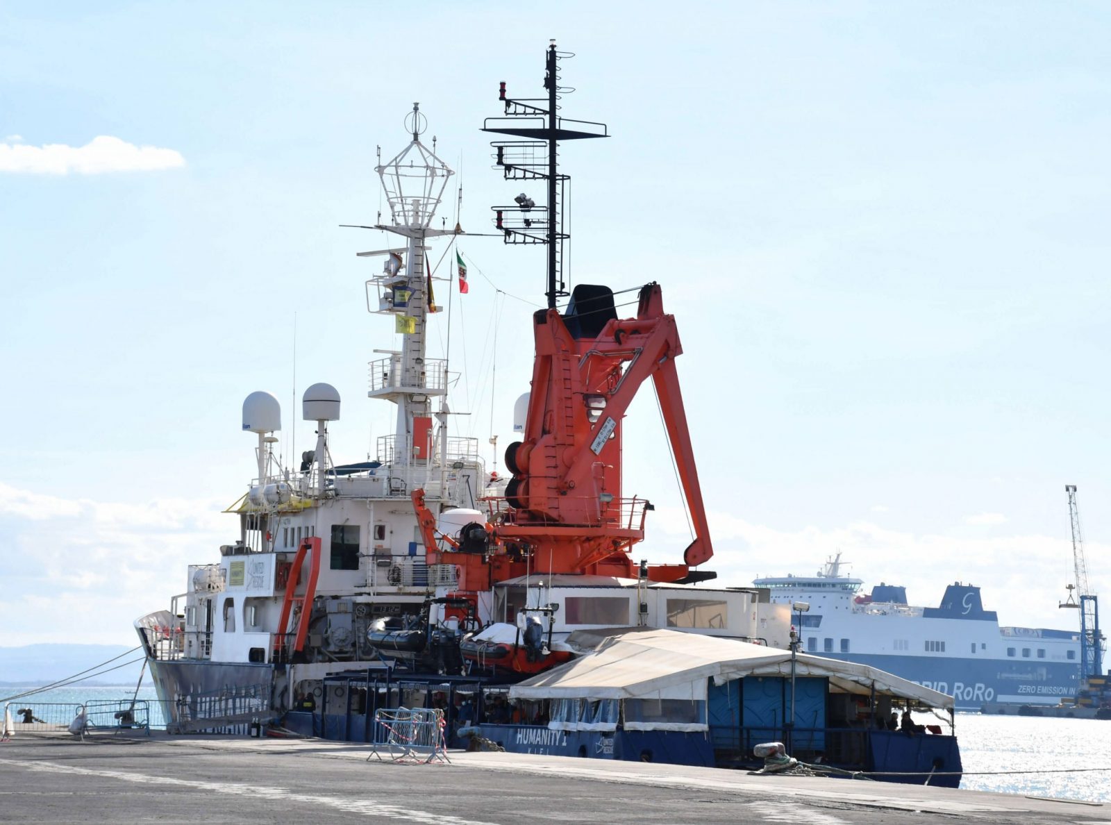 epa10292286 The ship 'Humanity 1' moored in the port of Catania, Italy, 07 November 2022. The 'Humanity 1' ship was issued an interministerial decree on 06 November, which ordered that the vessel must leave the port of Catania after having finished the disembarkation. The captain and crew of the ship have decided not to obey the decree because 'they have no alternative'. 'We are preparing an appeal that in the next few hours will be filed at the Lazio Regional Administrative Court. It's the first legal action we're operating on', lawyer of the German NGO, Riccardo Campochiaro said.  EPA/ORIETTA SCARDINO