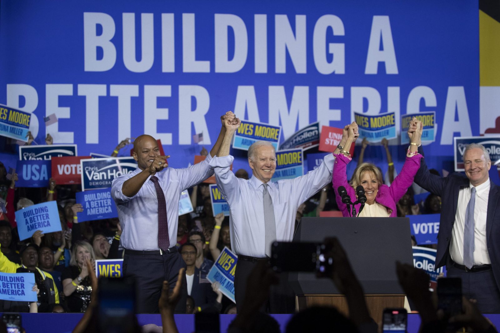 epa10292972 US President Joe Biden (2-L) and First Lady Jill Biden (2-R) participate in a rally for the Democratic Party, with Maryland Democratic gubernatorial candidate Wes Moore (L) and Democratic Senator of Maryland Chris Van Hollen (R), on the eve of election day at Bowie State University in Bowie, Maryland, USA, 07 November 2022. The US midterm elections are held every four years at the midpoint of each presidential term and this year include elections for all 435 seats in the House of Representatives, 35 of the 100 seats in the Senate and 36 of the 50 state governors as well as numerous other local seats and ballot issues.  EPA/MICHAEL REYNOLDS