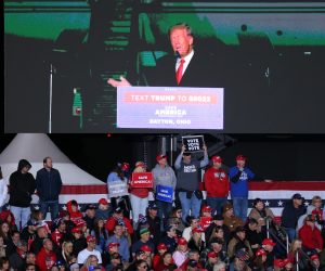 epa10293177 Former US President Donald J. Trump is shown on a digital display above supporters as he speaks at a rally at the Wright Bros. Aero Inc., at Dayton International Airport in Vandalia, Ohio, USA, 07 November 2022. Trump is holding rallies in support of Republican candidates before the midterm elections. The US midterm elections are held every four years at the midpoint of each Presidential term and include elections for all 435 seats in the House of Representatives, 33 or 34 of the 100 seats in the Senate and 36 of the 50 state governors as well as numerous other local seats and ballot issues.  EPA/MARK LYONS