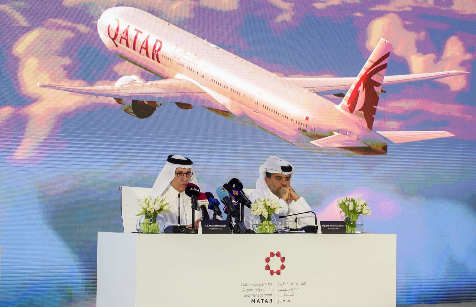 epa10298118 CEO of Qatar Airways Akbar Al Baker (L) and Hamad International Airport Chief Operating Officer Badr Mohammed Al Meer attend a press conference to unveil expansions at the airport, in Doha, Qatar, 10 November 2022. Hamad International Airport on 10 November officially revealed its expansion project ahead of FIFA World Cup Qatar 2022. According to the airport, the new expansion project allows the airport to deal with over 58 million passengers annually, and the most notably project unveiled was 'The Orchard', an indoor tropical garden that is expected to include over 300 trees and over 25,000 plants.  EPA/NOUSHAD THEKKAYIL