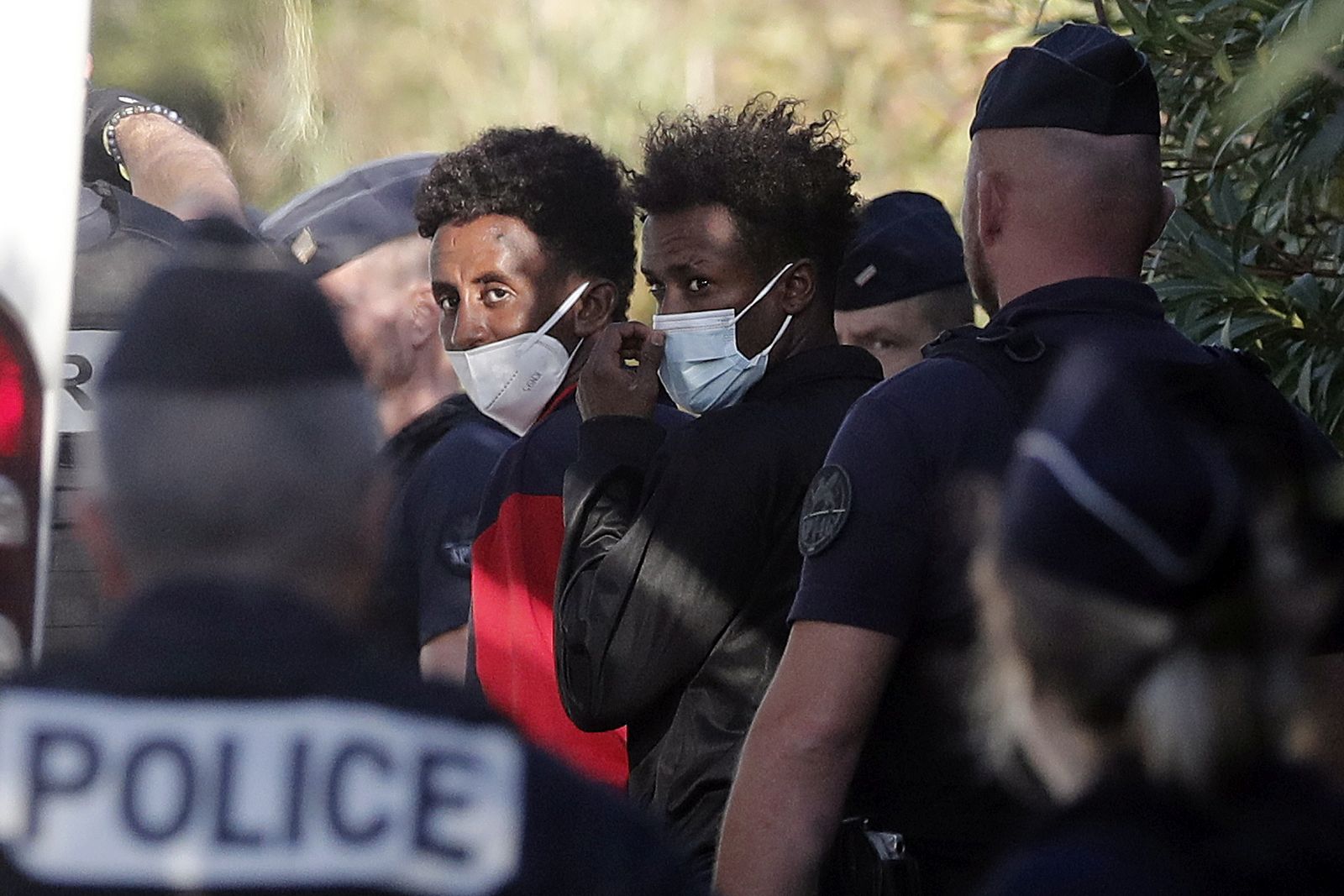 epa10300052 Migrants from the Ocean Viking rescue ship arrive by bus at a center where they will stay temporarily, in Hyeres, France, 11 November 2022. The ship arrived in the nearby port of Toulon on 11 November after French authorities gave the green light the previous day to allow the over 230 migrants onboard to disembark. The vessel spent weeks at sea after rescuing migrants during several operations throughout October.  EPA/GUILLAUME HORCAJUELO