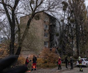 epa10307129 Firefighters work to extinguish the fire in a residential building that was hit during a Russian attack, in Kyiv, Ukraine, 15 November 2022. At least two residential buildings were hit in Kyiv during the Russian strikes, according to the capital's mayor Vitali Klitschko. Russian troops entered Ukraine on 24 February 2022, starting a conflict that has provoked destruction and a humanitarian crisis.  EPA/ROMAN PILIPEY