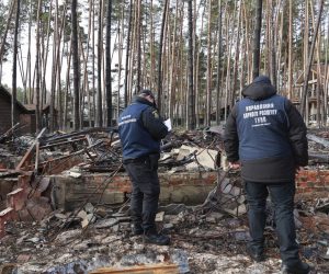 epa10307557 Ukrainian police experts investigate recaptured territory after Russian occupation in Volchansk city of Kharkiv area, Ukraine, 15 November 2022. Kharkiv and surrounding areas have been the target of heavy shelling since February 2022, when Russian troops entered Ukraine starting a conflict that has provoked destruction and a humanitarian crisis. At the beginning of September, the Ukrainian army pushed Russian forces from occupied territory northeast of the country in counterattacks.  EPA/SERGEY KOZLOV