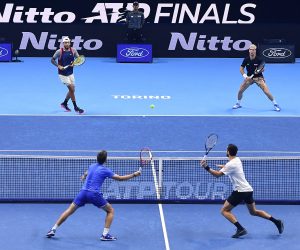epa10313111 Thanasi Kokkinakis of Austalia and Nick Kyrgios of Australia (up) in action against Mate Pavic of Croatia and Nikola Mektic of Croatia during their doubles match at the Nitto ATP Finals 2022 tennis tournament at the Pala Alpitour arena in Turin, Italy, 18 November 2022.  EPA/ALESSANDRO DI MARCO