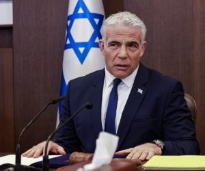 epa10315625 Israel’s outgoing Prime Minister Yair Lapid heads a cabinet meeting in Jerusalem, 20 November 2022.  EPA/MENAHEM KAHANA / POOL