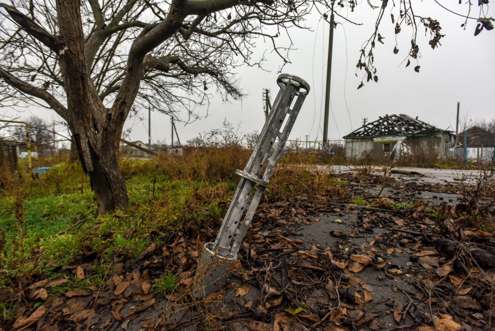 epa10316219 The remains of a missile stuck in the ground in Posad-Pokrovske village, Kherson region, Ukraine, 20 November 2022. Ukrainian troops entered Kherson city on 11 November after Russian troops had withdrawn from the city. Kherson was captured in the early stage of the conflict, shortly after Russian troops had entered Ukraine in February 2022.  EPA/OLEG PETRASYUK