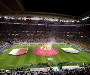 epa10316191 The flags of Qatar (L) and Ecuador are brought onto the pitch prior to kick-off of the FIFA World Cup 2022 group A Opening Match between Qatar and Ecuador at Al Bayt Stadium in Al Khor, Qatar, 20 November 2022.  EPA/Ronald Wittek