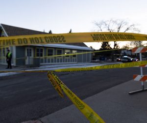 epa10319251 Police tape blocks off the area surrounding the LGBTQ nightclub Club Q, in Colorado Springs, Colorado, USA, 21 November 2022. According to police, at least five people were killed and 25 people were wounded during a mass shooting inside the nightclub on Saturday night.  EPA/LIZ COPAN