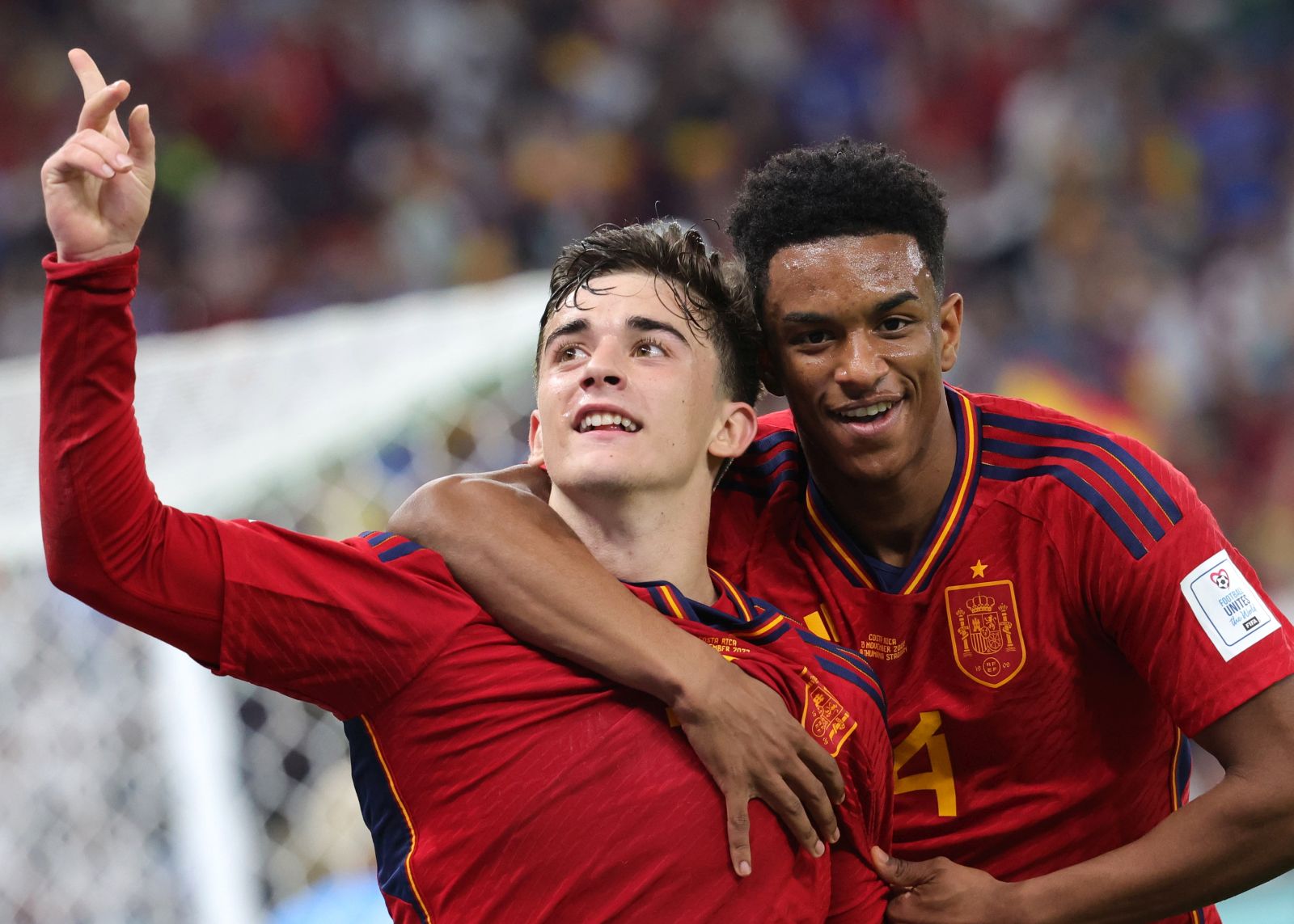 epa10323355 Gavi (L) of Spain celebrates scoring the 5-0 lead during the FIFA World Cup 2022 group E soccer match between Spain and Costa Rica at Al Thumama Stadium in Doha, Qatar, 23 November 2022.  EPA/Abir Sultan