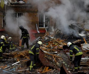 epa10323452 Firefighters work at the site of an apartment block destroyed by shelling in Vyshhorod, near Kyiv (Kiev), Ukraine, 23 November 2022, amid Russia's invasion. At least four people were killed and 27 others injured as a result of Russian shelling hitting the Vyshhorod district, Kyiv Oblast Police Chief Andrii Nebytov said on telegram. According to a statement by Ukraine's national power supply Ukrenergo on 23 November, power outages were reported across all of the regions of the country following a series of Russian missile strikes targeting Ukraine's critical infrastructure. Russian troops on 24 February entered Ukrainian territory, starting a conflict that has provoked destruction and a humanitarian crisis.  EPA/OLEG PETRASYUK