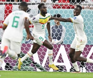 epa10327506 Boulaye Dia (C) of Sengal celebrates after scoring the 1-0 goal during the FIFA World Cup 2022 group A soccer match between Qatar and Senegal at Al Thumama Stadium in Doha, Qatar, 25 November 2022.  EPA/Noushad Thekkayil