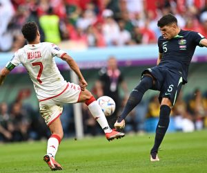 epa10329462 Youssef Msakni (L) of Tunisia in action against Fran Karacic of Australia during the FIFA World Cup 2022 group D soccer match between Tunisia and Australia at Al Janoub Stadium in Al Wakrah, Qatar, 26 November 2022.  EPA/Noushad Thekkayil