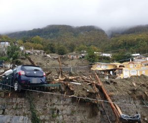 epa10331232 An area affected by a landslide in Ischia island, in the Gulf of Naples, Italy, 26 November 2022. A group of people are feared to be missing after heavy rain caused a landslide from the top of the Epomeo mountain, at a height of about 780 meters, and reached the seafront, overwhelming some parked cars and dragging them to the sea.  EPA/CIRO FUSCO ITALY OUT