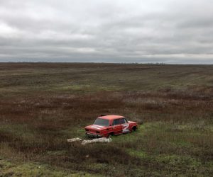 epa10333052 A car with the letter Z on a field in the recently liberated area of the Mykolaiv region, near the border with the Kherson region, in southern Ukraine, 27 November 2022. Fearing the lack of electricity and running water in the recently liberated areas of Kherson and Mykolaiv regions, Ukrainian authorities are asking civilians to evacuate before the winter season starts.  EPA/ROMAN PILIPEY