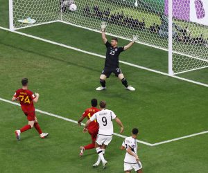 epa10333402 Niclas Fuellkrug of Germany (C, bottom) scores the 1-1 goal against goalkeeper Unai Simon of Spain during the FIFA World Cup 2022 group E soccer match between Spain and Germany at Al Bayt Stadium in Al Khor, Qatar, 27 November 2022.  EPA/Rungroj Yongrit