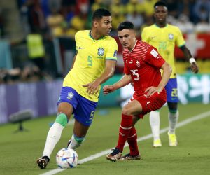 epa10334715 Casemiro (L) of Brazil in action against Fabian Rieder of Switzerland during the FIFA World Cup 2022 group G soccer match between Brazil and Switzerland at Stadium 947 in Doha, Qatar, 28 November 2022.  EPA/Rungroj Yongrit