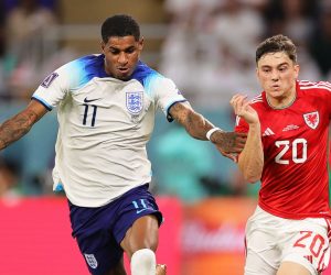 epa10337410 Marcus Rashford (L) of England in action against Daniel James (R) of Wales during the FIFA World Cup 2022 group B soccer match between Wales and England at Ahmad bin Ali Stadium in Doha, Qatar, 29 November 2022.  EPA/Friedemann Vogel