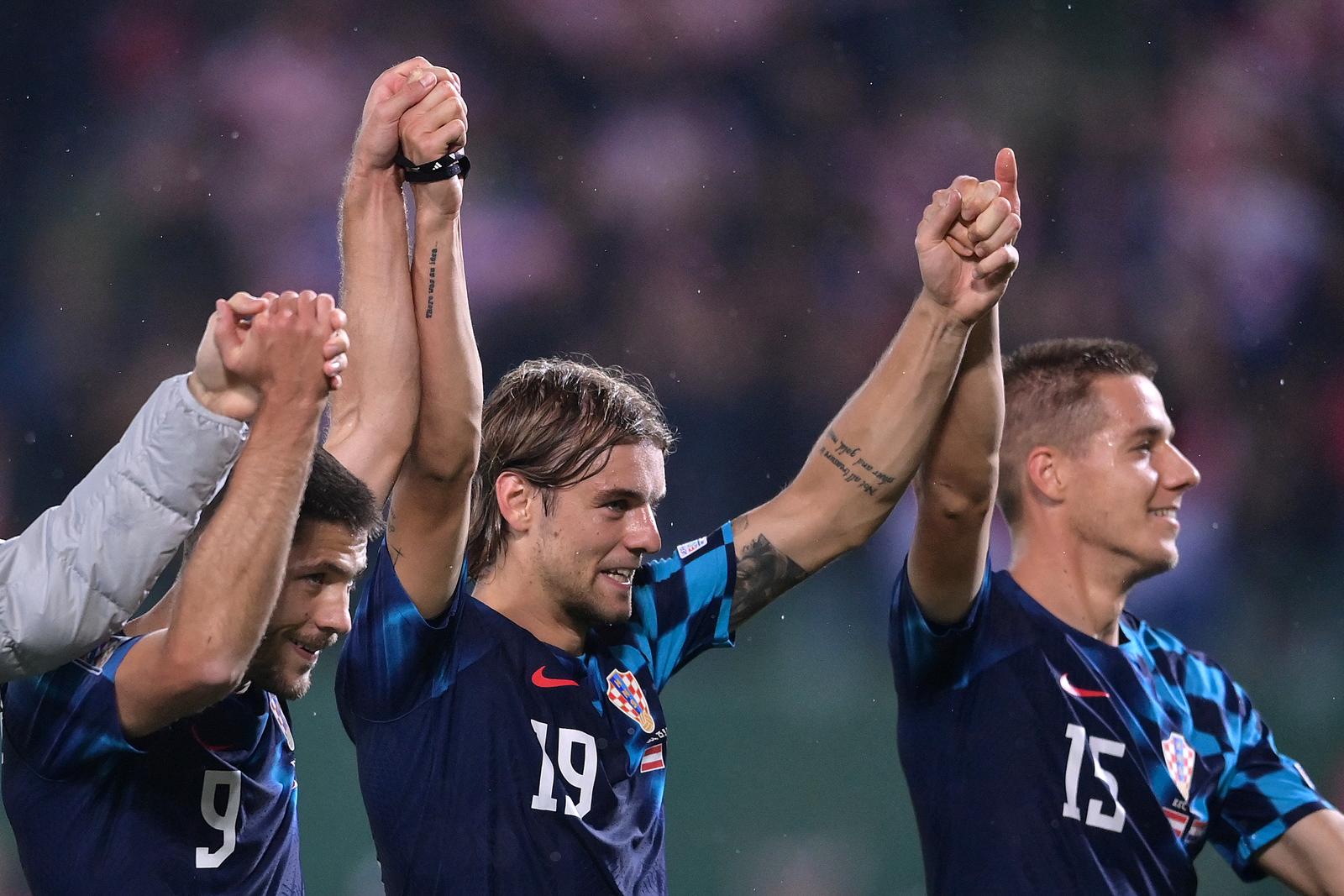 25.09.2022., stadion Ernst Happel, Bec, Austrija - UEFA Liga nacija, Liga A, skupina 1, 6. kolo, Austrija - Hrvatska. Slavlje hrvatskih igraca nakon pobjede nad Austrijom i osvojenim prvim mjestom u skupini. Andrej Kramaric, Borna Sosa, Mario Pasalic.  Photo: Igor Soban/PIXSELL