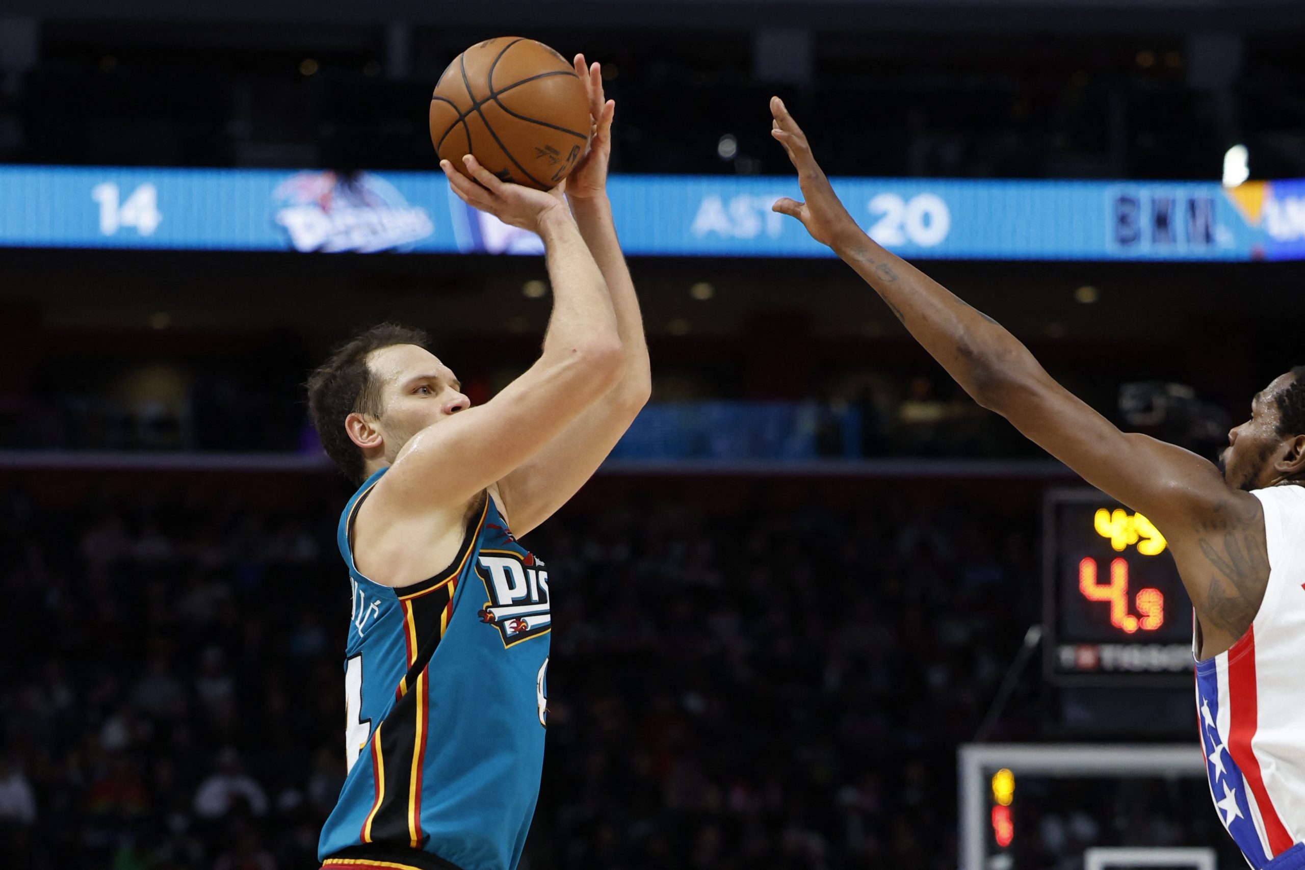 Dec 18, 2022; Detroit, Michigan, USA; Detroit Pistons forward Bojan Bogdanovic (44) shoots on Brooklyn Nets forward Kevin Durant (7) in the second half at Little Caesars Arena. Mandatory Credit: Rick Osentoski-USA TODAY Sports