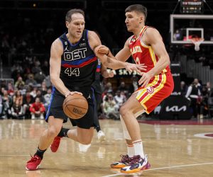 Dec 23, 2022; Atlanta, Georgia, USA; Detroit Pistons forward Bojan Bogdanovic (44) dribbles defended by Atlanta Hawks guard Bogdan Bogdanovic (13) during the first half at State Farm Arena. Mandatory Credit: Dale Zanine-USA TODAY Sports