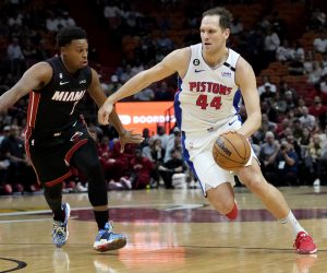 Miami Heat guard Kyle Lowry (7) defends against Detroit Pistons forward Bojan Bogdanovic (44) during the first half of an NBA basketball game Tuesday, Dec. 6, 2022, in Miami. (AP Photo/Lynne Sladky)