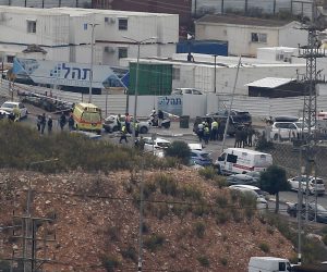 epa10306627 Israeli security forces check the site of a stabbing attack, near the West Bank Jewish settlement of Elkana, south of Nablus city, 15 November 2022. Two Israelis were killed and four wounded in an attack in a settlement in the West Bank on 15 November, according to officials.  EPA/ALAA BADARNEH