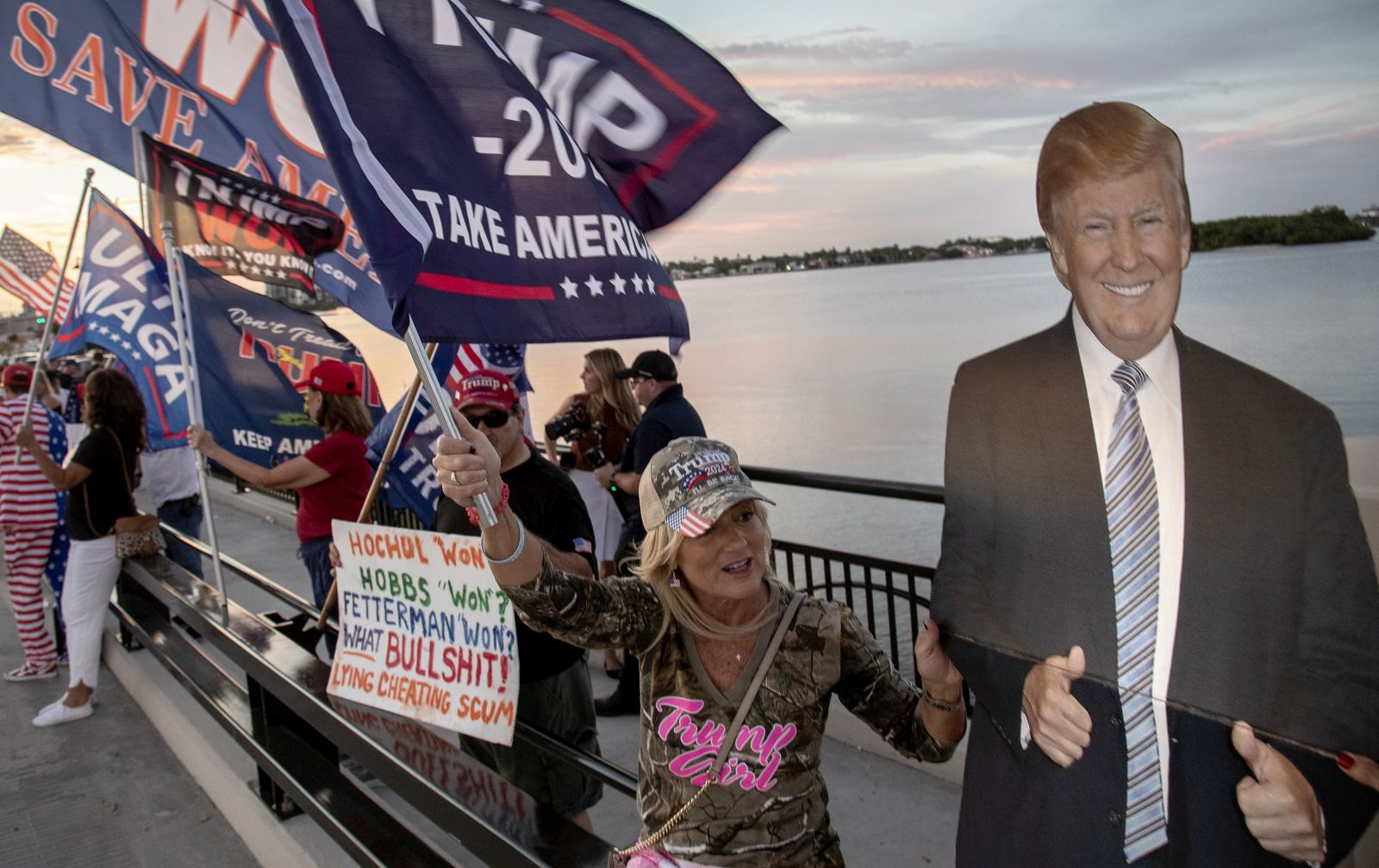 epa10307686 Supporters of former US President Donald Trump stand outside the Mar-a-Lago Club where Trump will make an announcement in Palm Beach, Florida, USA, 15 November 2022. Trump is expected to announce his third run at the presidency in the 2024 election.  EPA/CRISTOBAL HERRERA-ULASHKEVICH