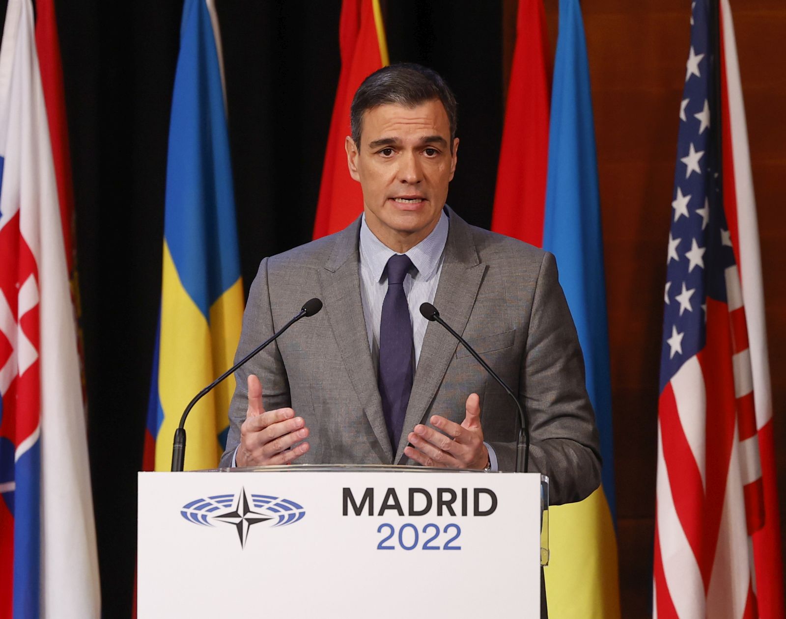 epa10317403 Spanish Prime Minister Pedro Sanchez delivers a speech during the plenary session of the 68th NATO Parliamentary Assembly in Madrid, Spain, 21 November 2022. NATO Parliamentary Assemblys Annual Session runs in Spains capital from 18 to 21 November 2022, with the participation of NATO Secretary General Jens Stoltenberg and, by telematic means, the President of Ukraine, Volodymyr Zelensky.  EPA/CHEMA MOYA