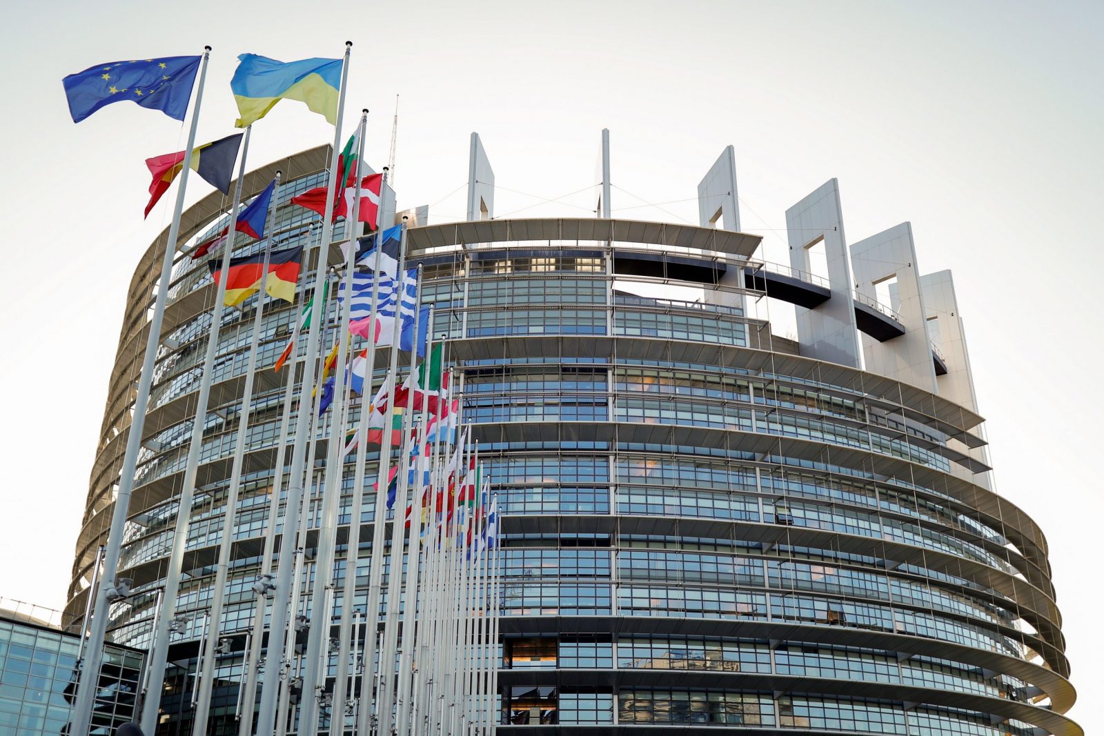 epa10321854 Flags in front of the European Parliament building in Strasbourg, France, 23 November 2022.  EPA/JULIEN WARNAND