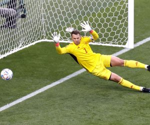 epa10322419 Daizen Maeda (R) of Japan scores against goalkeeper Manual Neuer of Germany but the goal is ruled offside during the FIFA World Cup 2022 group E soccer match between Germany and Japan at Khalifa International Stadium in Doha, Qatar, 23 November 2022.  EPA/Rungroj Yongrit