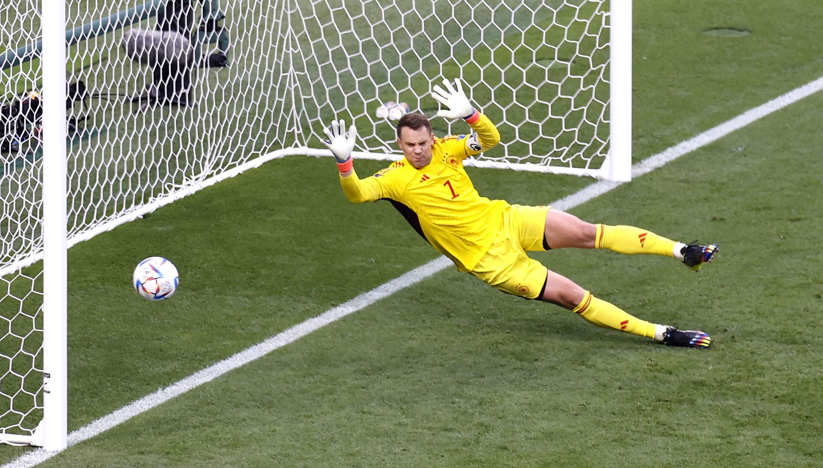 epa10322419 Daizen Maeda (R) of Japan scores against goalkeeper Manual Neuer of Germany but the goal is ruled offside during the FIFA World Cup 2022 group E soccer match between Germany and Japan at Khalifa International Stadium in Doha, Qatar, 23 November 2022.  EPA/Rungroj Yongrit