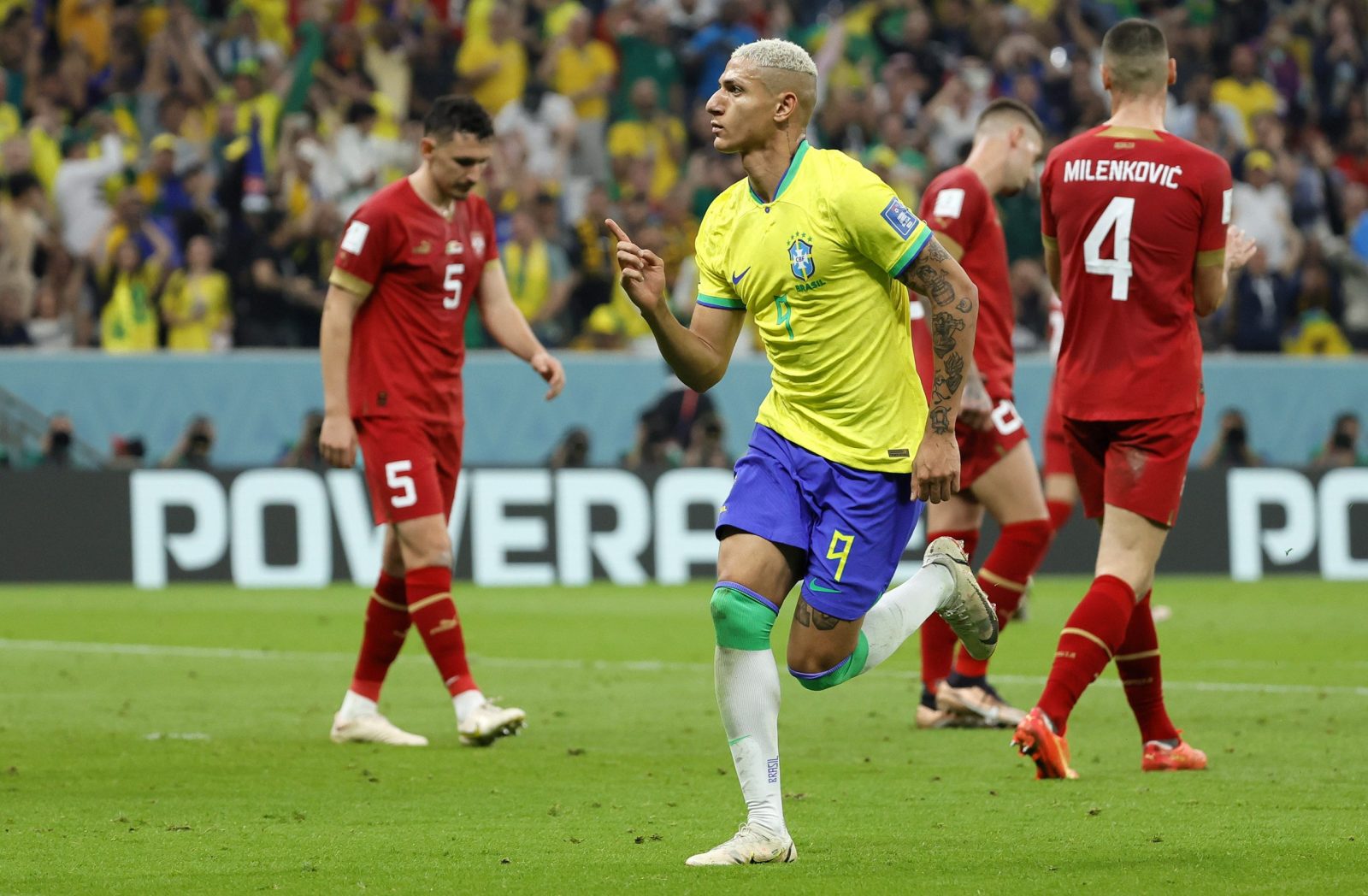 epa10326220 Richarlison of Brazil celebrates after scoring his second goal during the FIFA World Cup 2022 group G soccer match between Brazil and Serbia at Lusail Stadium in Lusail, Qatar, 24 November 2022.  EPA/Ronald Wittek