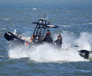 epa10327132 Police forces patrol by boat in Calais, France, 25 November 2022. 24 November marked the 1st anniversary of the shipwreck that killed 27 migrants trying to cross La Manche canal (English Channel) to Great Britain.  EPA/YOAN VALAT