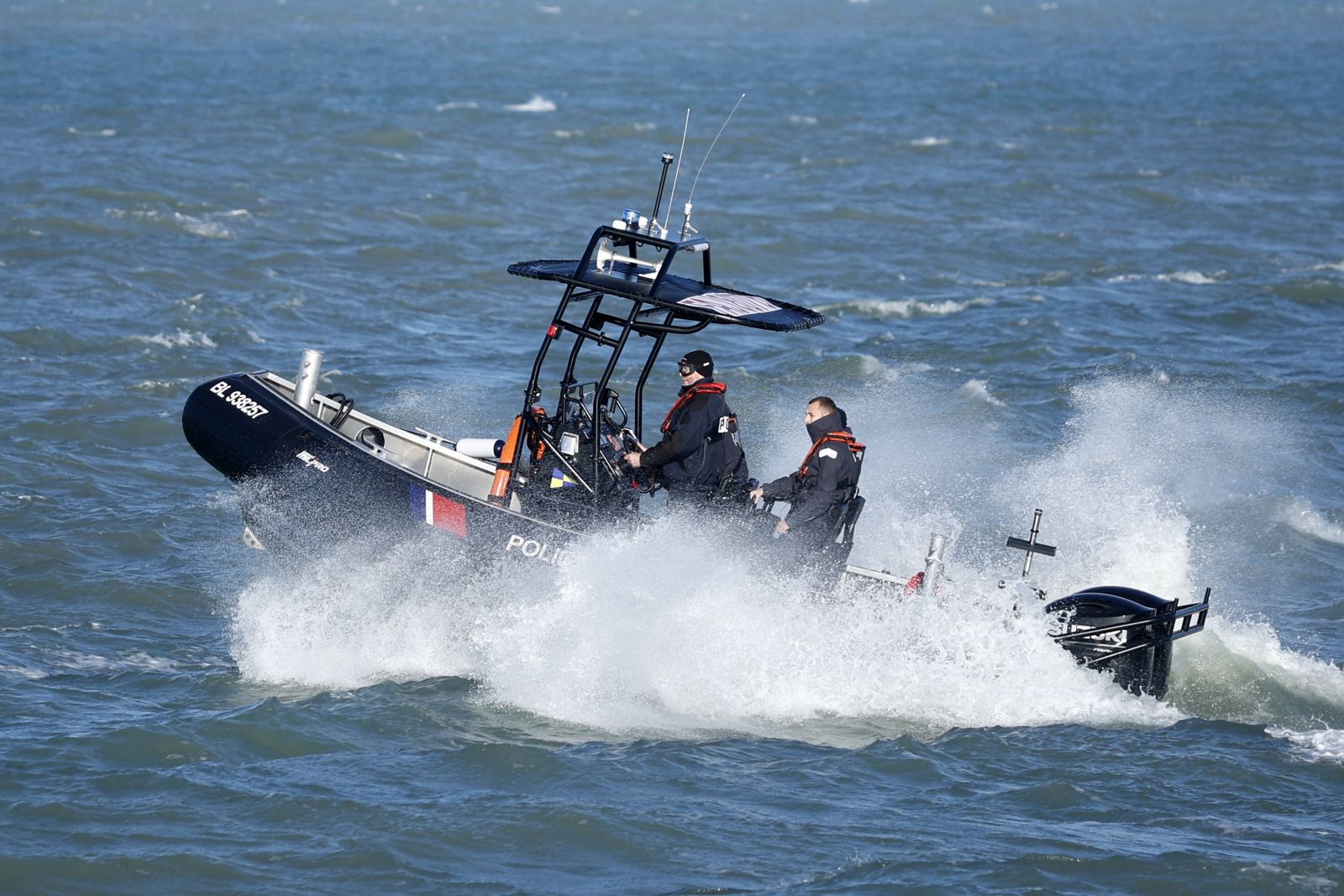 epa10327132 Police forces patrol by boat in Calais, France, 25 November 2022. 24 November marked the 1st anniversary of the shipwreck that killed 27 migrants trying to cross La Manche canal (English Channel) to Great Britain.  EPA/YOAN VALAT