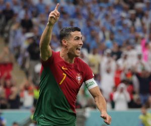epa10335298 Cristiano Ronaldo of Portugal celebrates after scoring the 1-0 during the FIFA World Cup 2022 group H soccer match between Portugal and Uruguay at Lusail Stadium in Lusail, Qatar, 28 November 2022.  EPA/Abir Sultan
