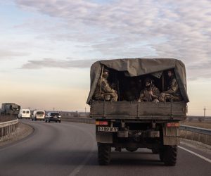 epa10342326 Ukrainian soldiers ride in a military truck in the Dnipropetrovsk region on the road to the Donetsk area, Ukraine, 01 December 2022, amid Russian invasion. Russian troops entered Ukraine on 24 February 2022 starting a conflict that has provoked destruction and a humanitarian crisis.  EPA/ROMAN PILIPEY