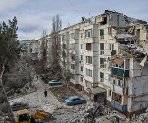 epa10344318 Ukrainian rescuers work on a building that was destroyed during night shelling in the village of Kluhyno-Bashkyrivka near Chuhuiv, Kharkiv region, Ukraine, 02 December 2022. Kharkiv and surrounding areas have been the target of heavy shelling since February 2022, when Russian troops entered Ukraine starting a conflict that has provoked destruction and a humanitarian crisis. At the beginning of September, the Ukrainian army pushed Russian forces from occupied territory northeast of the country in counterattacks  EPA/SERGIY KOZLOV