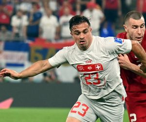 epa10345133 Strahinja Pavlovic (R) of Serbia in action against Xherdan Shaqiri of Switzerland during the FIFA World Cup 2022 group G soccer match between Serbia and Switzerland at Stadium 947 in Doha, Qatar, 02 December 2022.  EPA/Georgi Licovski