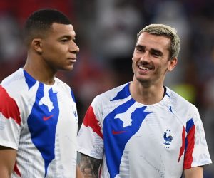 epa10347890 Kylian Mbappe (L) and Antoine Griezmann of France go through warm-up routines before the FIFA World Cup 2022 round of 16 soccer match between France and Poland at Al Thumama Stadium in Doha, Qatar, 04 December 2022.  EPA/Georgi Licovski